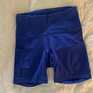 Lululemon shorts- Worn once, like new!! Beautiful blue color, has 7 pockets!!